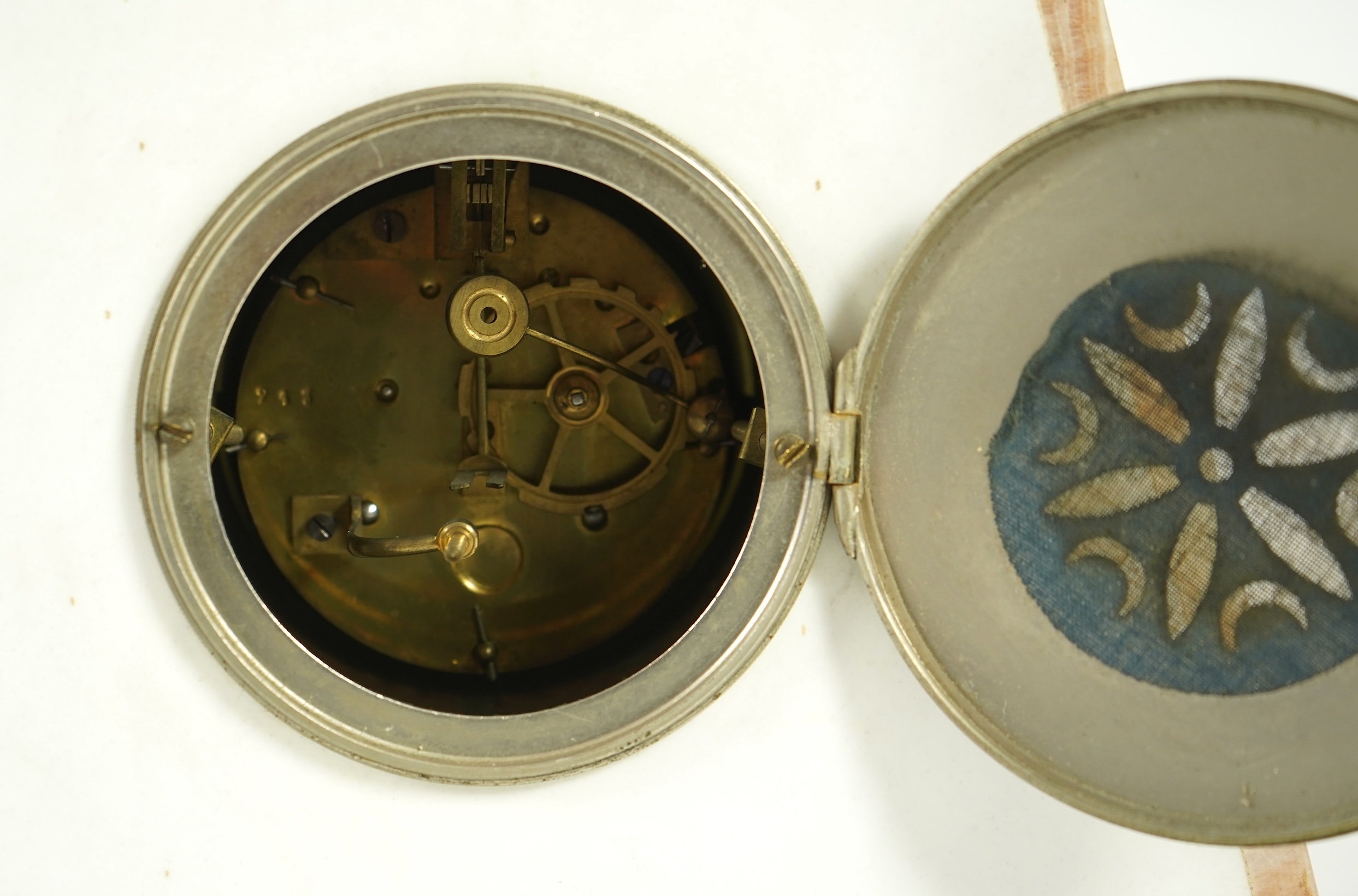 Attributed to Uriano (Ugo Cipriani, Italian, 1897-1960), a French green and cream onyx pyramid shaped clock